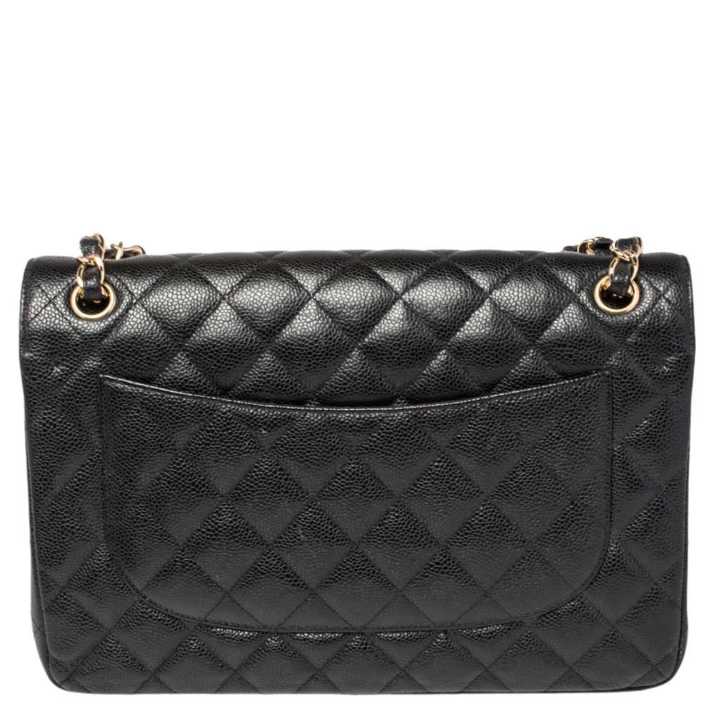 We are in utter awe of this flap bag from Chanel as it is appealing in a surreal way. Exquisitely crafted from Caviar leather in their quilt design, it bears their signature label on the leather interior and the iconic CC turn-lock on the flap. The