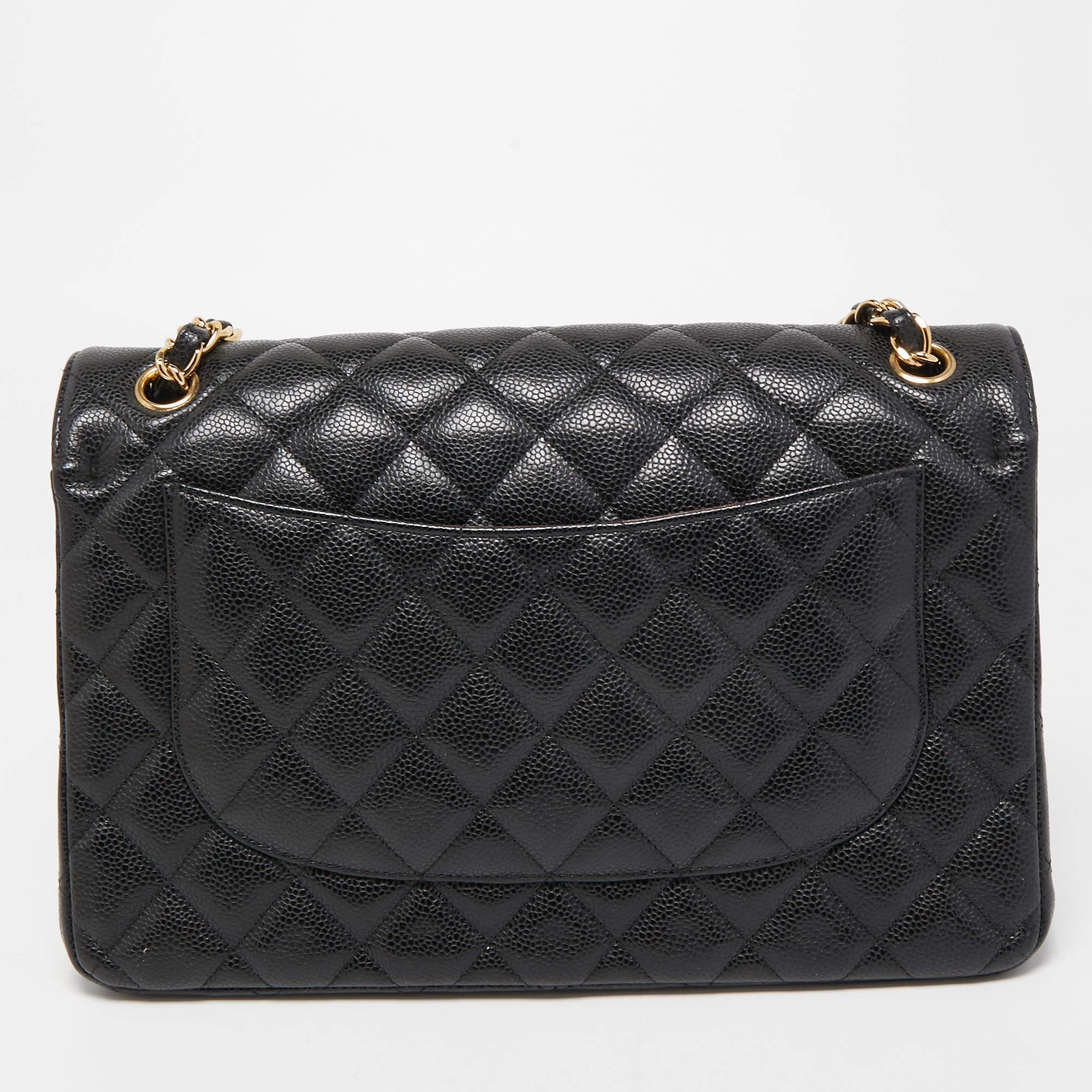 This bag from the house of Chanel is an accessory you would go to season after season. It has been crafted using quilted lambskin leather to be attractive as well as durable. It's a worthy investment.

Includes: Original Dustbag

