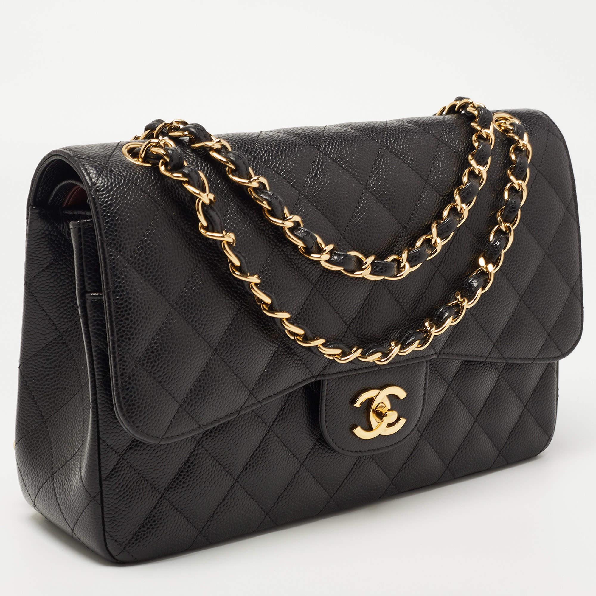 Chanel's luxurious Classic Flap bag is a must-have in a well-curated wardrobe! This stunning bag has a masterfully crafted leather exterior with gold-tone hardware and the iconic CC logo on the front. This Jumbo Classic Double Flap is complete with