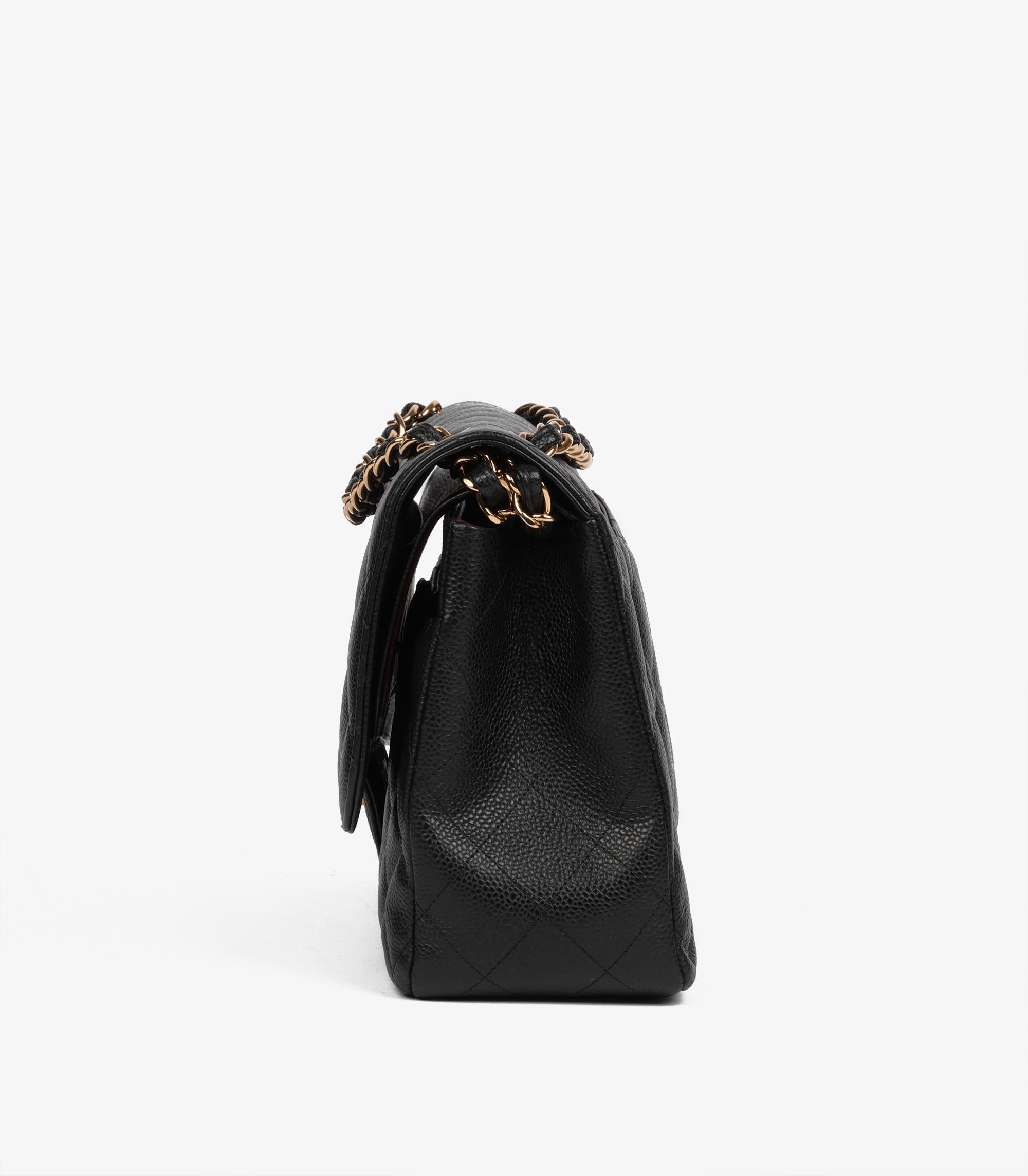 Chanel  Sac classique à double rabat en cuir caviar matelassé noir en vente 1