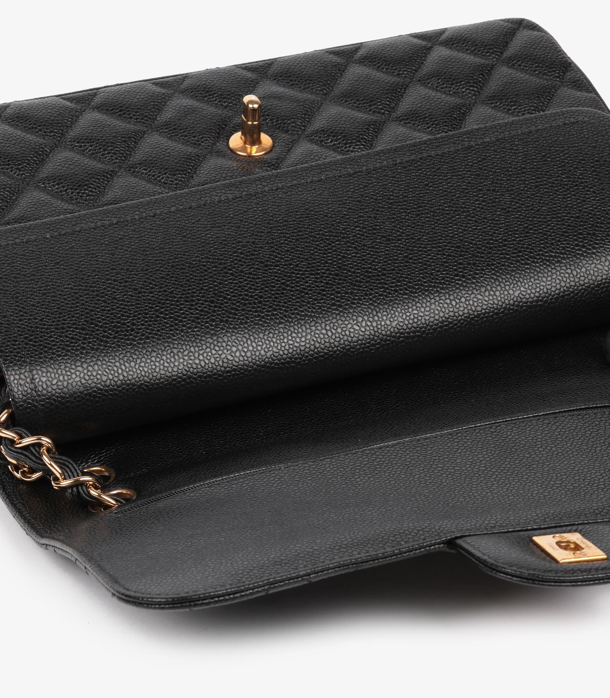 Chanel Schwarze gesteppte Jumbo Classic Double Flap Tasche aus Leder in Kaviar im Angebot 4