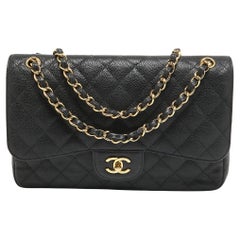 Used Chanel Black Quilted Caviar Leather Jumbo Classic Double Flap Bag