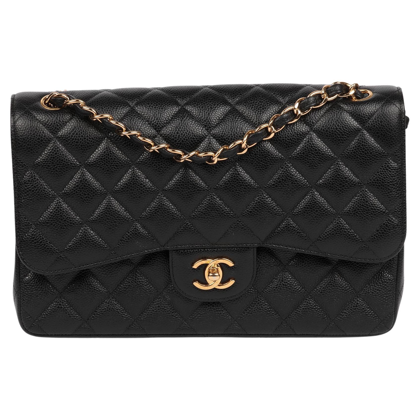 Chanel Schwarze gesteppte Jumbo Classic Double Flap Tasche aus Leder in Kaviar im Angebot