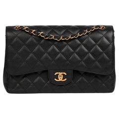 Chanel  Black Quilted Caviar Leather Jumbo Classic Double Flap Bag