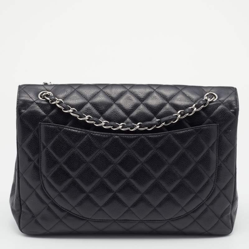We're bringing Chanel's iconic Classic Flap bag to your closet with this creation. Exquisitely crafted from quilted leather, it bears the signature label inside the leather interior and the iconic CC turn-lock on the flap. The black Chanel bag has
