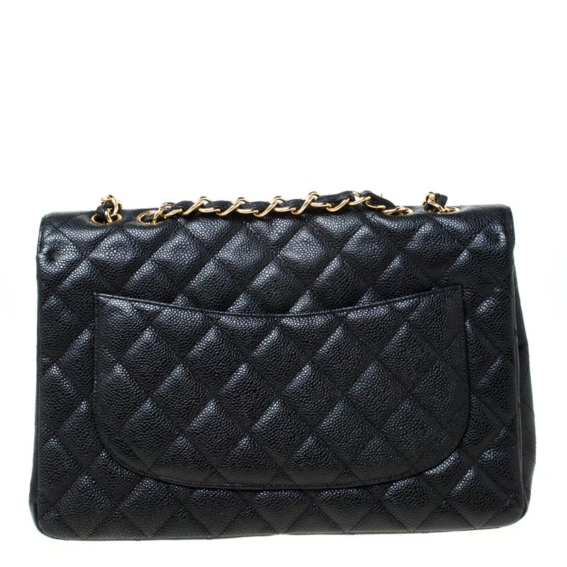 Chanel's Flap bags are iconic and monumental in the history of fashion. This classic single flap bag is crafted from black Caviar leather and features the iconic quilted pattern. It has a chain and leather interwoven shoulder strap along with the CC