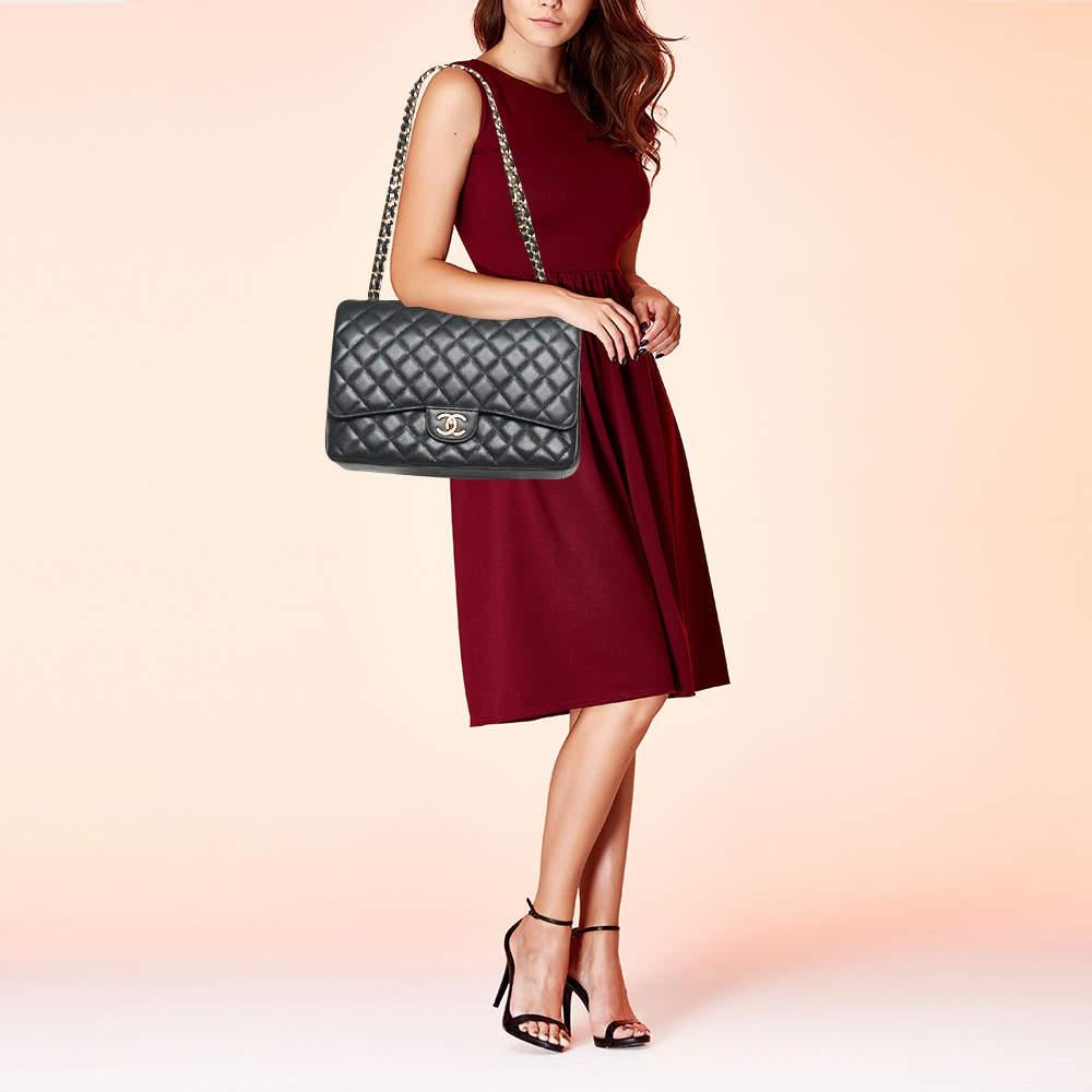 Reimagined season after season  the classic designs from Chanel manages to retain their classic glamour and noteworthy silhouettes. From one of the most celebrated collections  this Double Flap bag is enriched with historic details and functional
