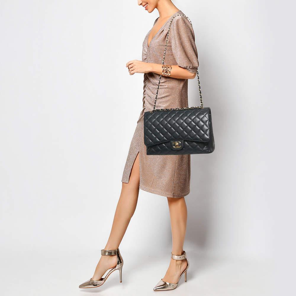 Reimagined season after season  the classic designs from Chanel manages to retain their classic glamour and noteworthy silhouettes. From one of the most celebrated collections  this Double Flap bag is enriched with historic details and functional