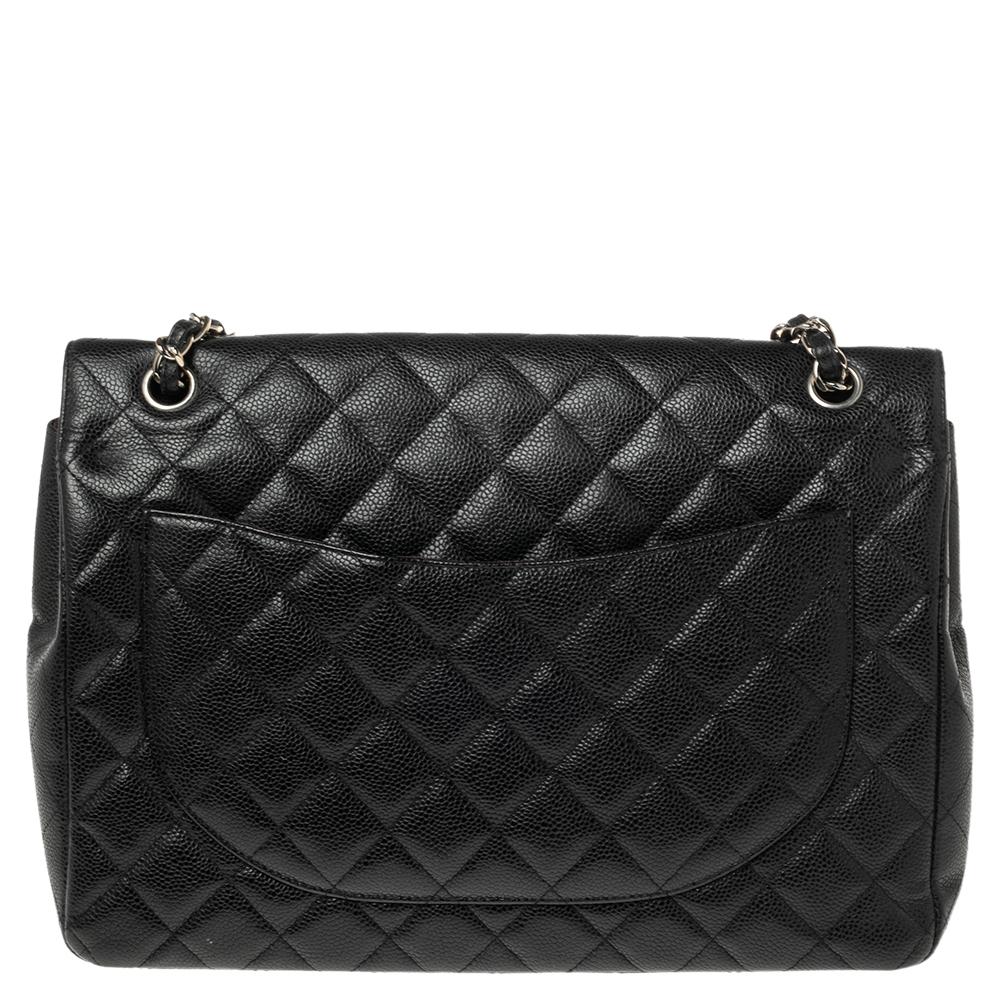 Chanel's Flap bags are iconic and monumental in the history of fashion. This Classic double flap bag is a buy that is worth every bit of your splurge. Exquisitely crafted from caviar leather, the bag features signature quilts all over the exterior.