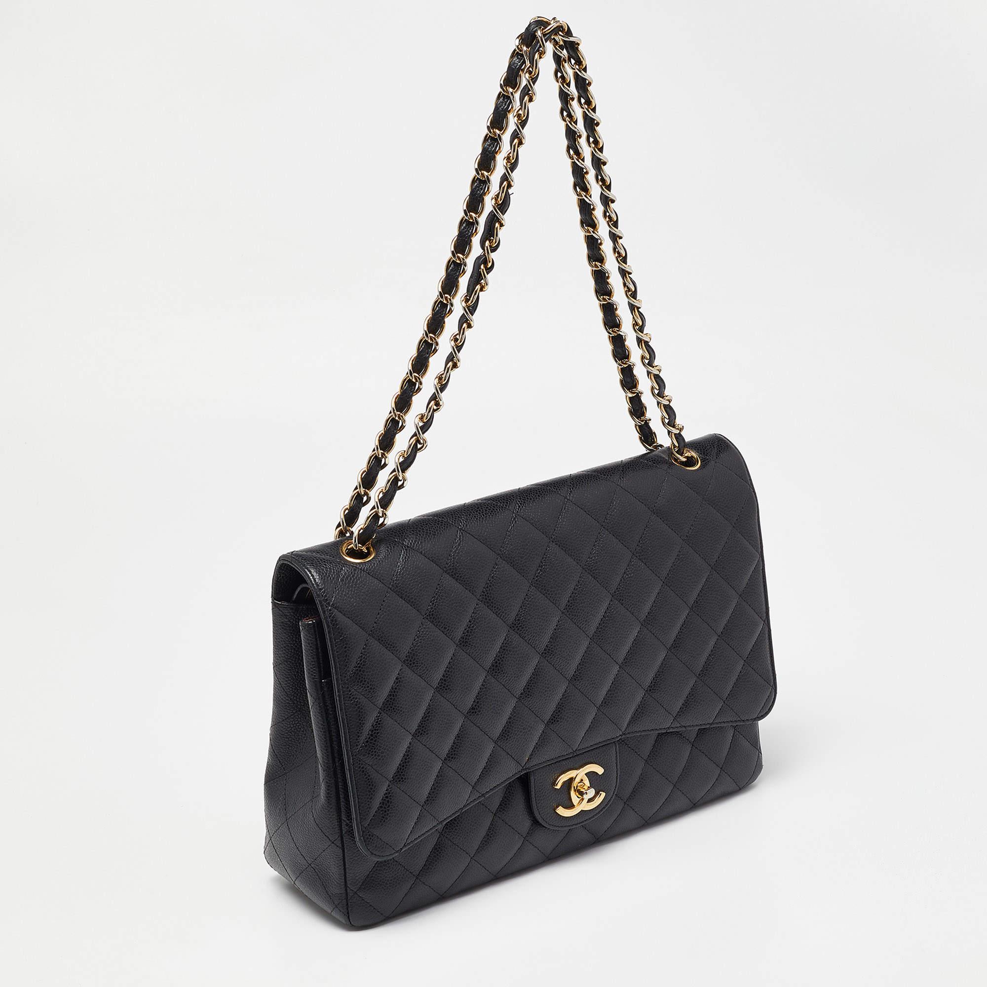 Chanel Black Quilted Caviar Leather Maxi Classic Double Flap Bag In Good Condition In Dubai, Al Qouz 2