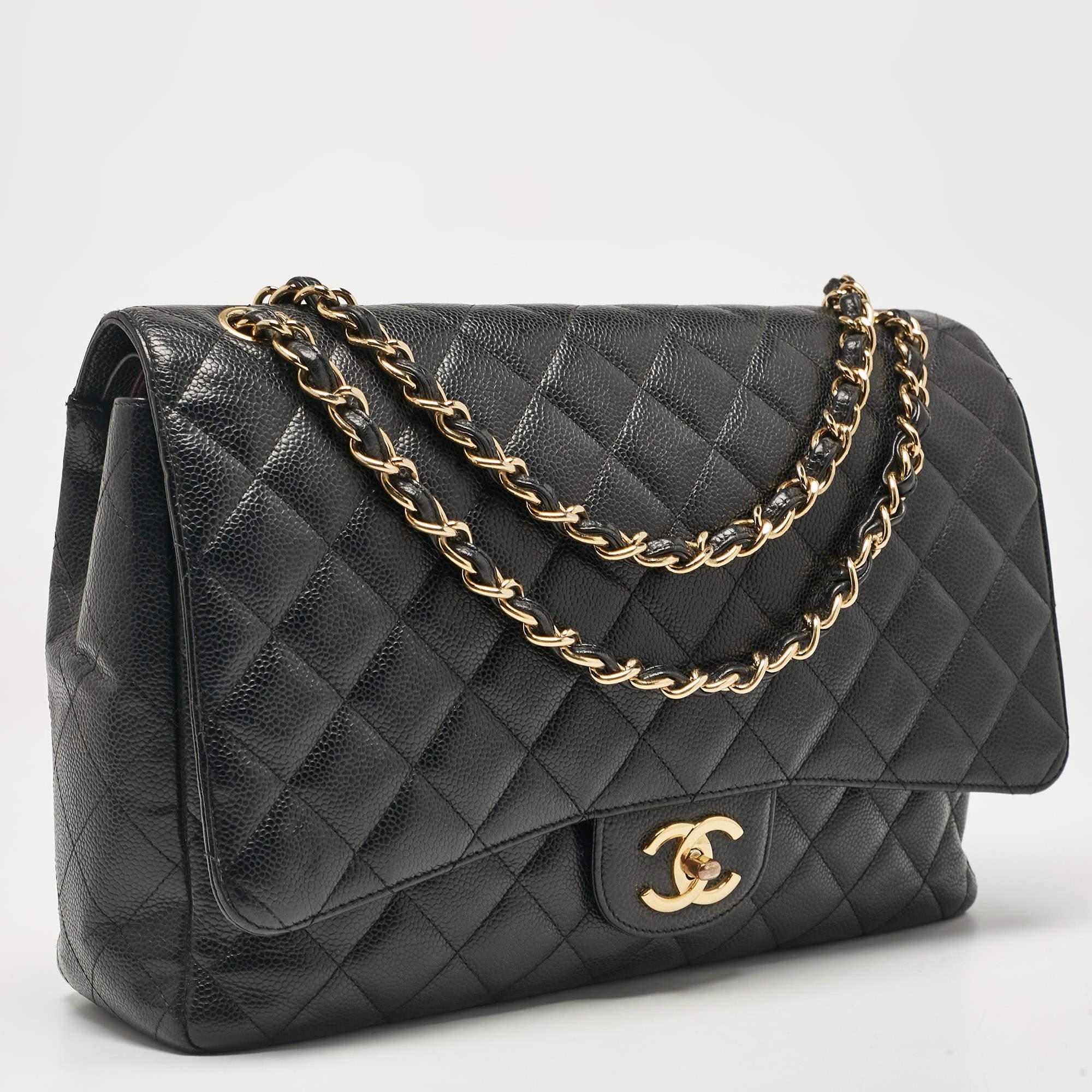 Chanel Black Quilted Caviar Leather Maxi Classic Double Flap Bag In Fair Condition For Sale In Dubai, Al Qouz 2