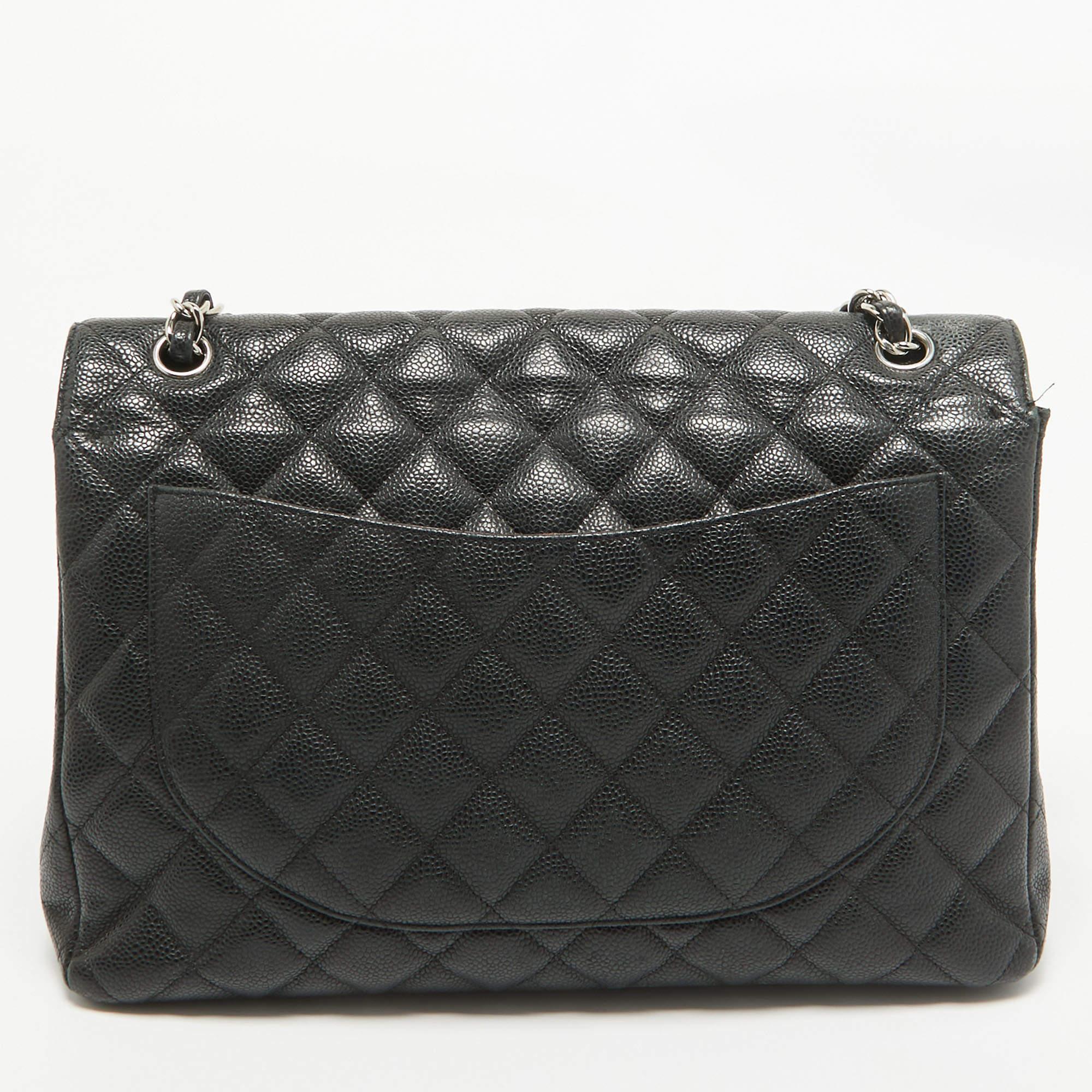 Women's Chanel Black Quilted Caviar Leather Maxi Classic Double Flap Bag For Sale