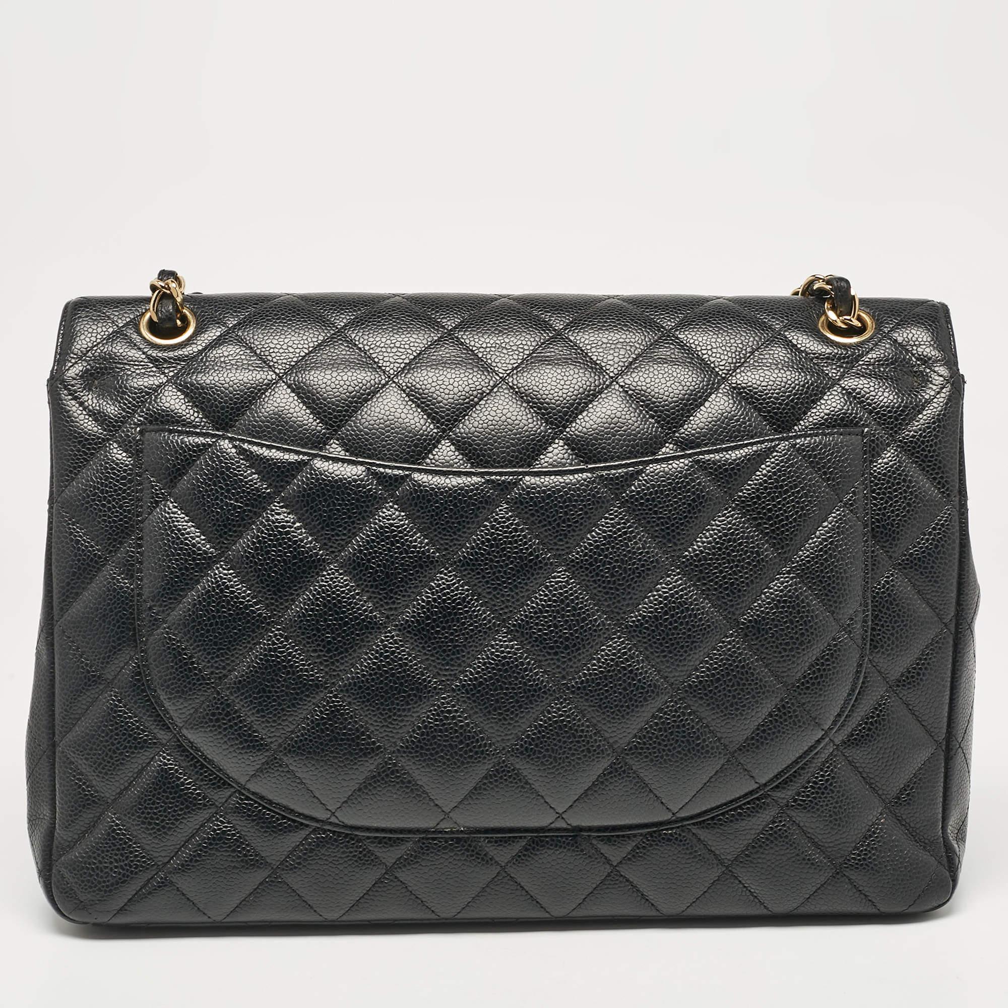 Women's Chanel Black Quilted Caviar Leather Maxi Classic Double Flap Bag For Sale