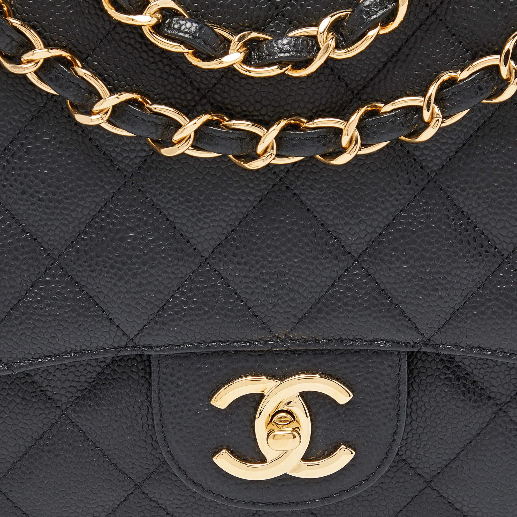 Women's Chanel Black Quilted Caviar Leather Maxi Classic Double Flap Bag For Sale