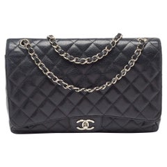 Chanel Black Quilted Caviar Leather Maxi Classic Double Flap Bag