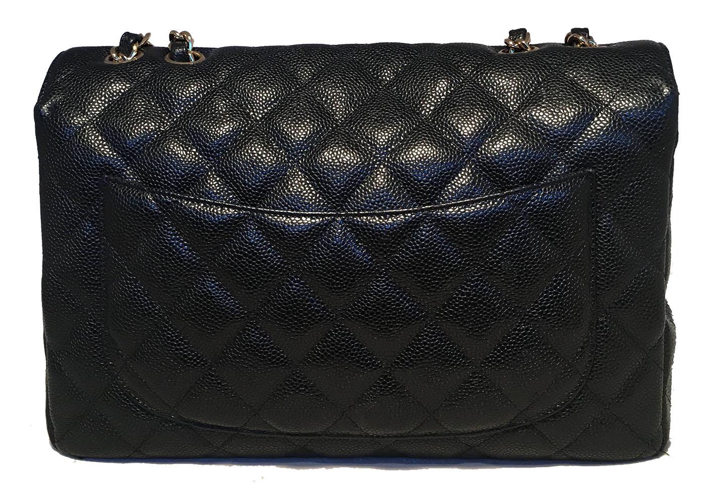 Chanel Black Quilted Caviar Leather Maxi Classic Flap Shoulder Bag In Excellent Condition In Philadelphia, PA