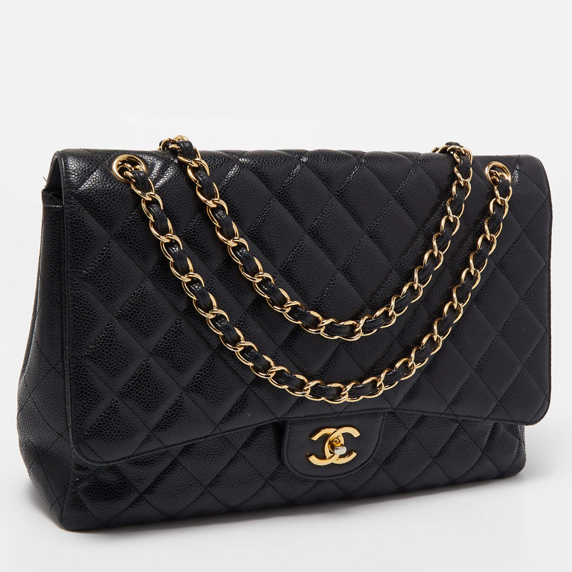 Elevate your style with this Chanel Maxi Classic Single Flap bag. Merging form and function, this exquisite accessory epitomizes sophistication, ensuring you stand out with elegance and practicality by your side.

