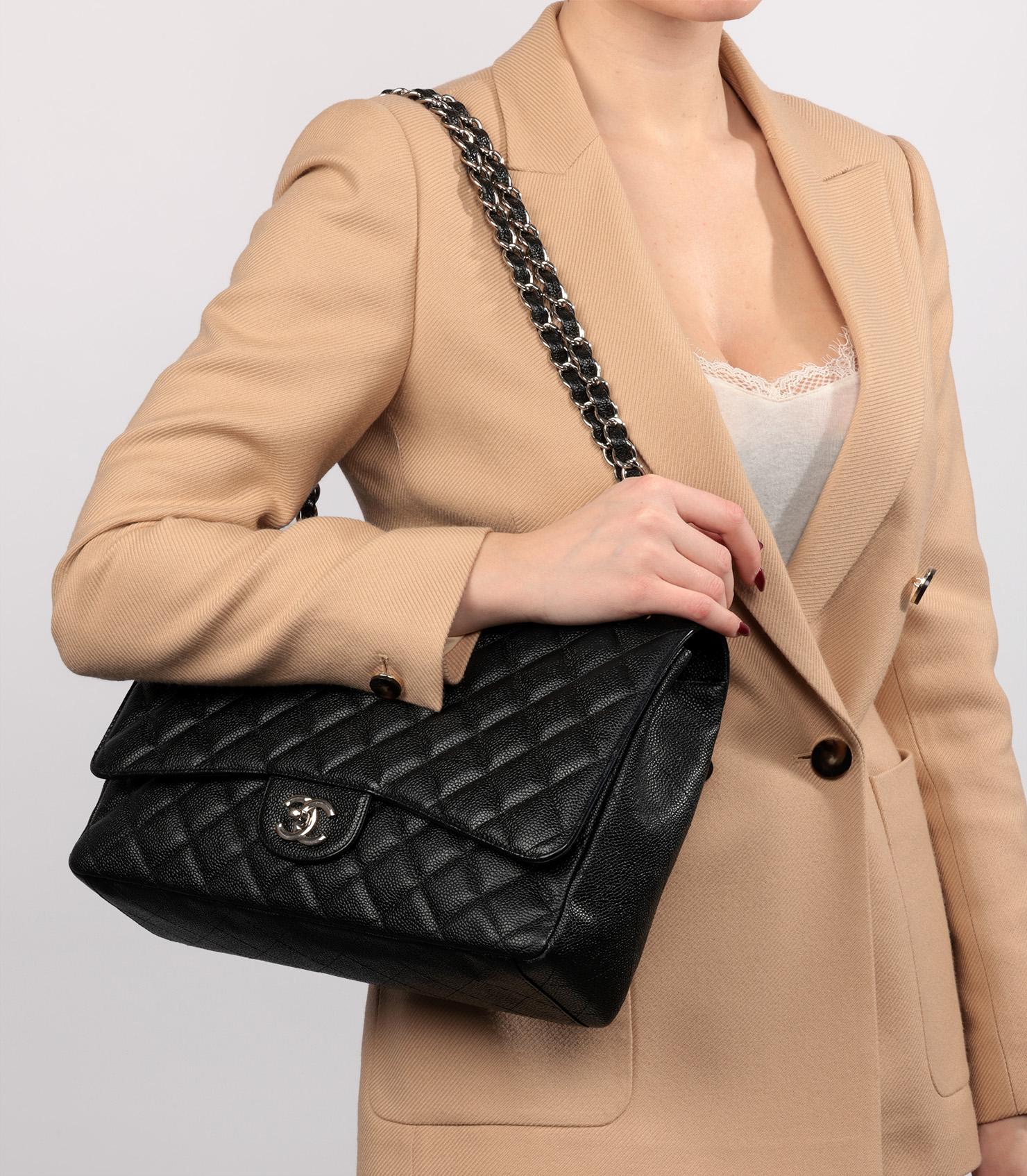 Chanel Black Quilted Caviar Leather Maxi Classic Single Flap Bag

Brand- Chanel
Model- Maxi Classic Single Flap Bag
Product Type- Crossbody, Shoulder
Serial Number- 13******
Age- Circa 2009
Colour- Black
Hardware- Silver
Material(s)- Caviar