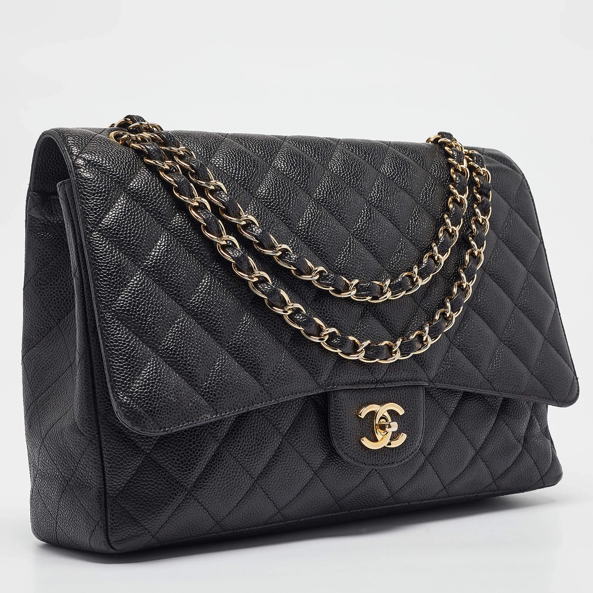 Chanel Black Quilted Caviar Leather Maxi Classic Single Flap Bag In Good Condition In Dubai, Al Qouz 2