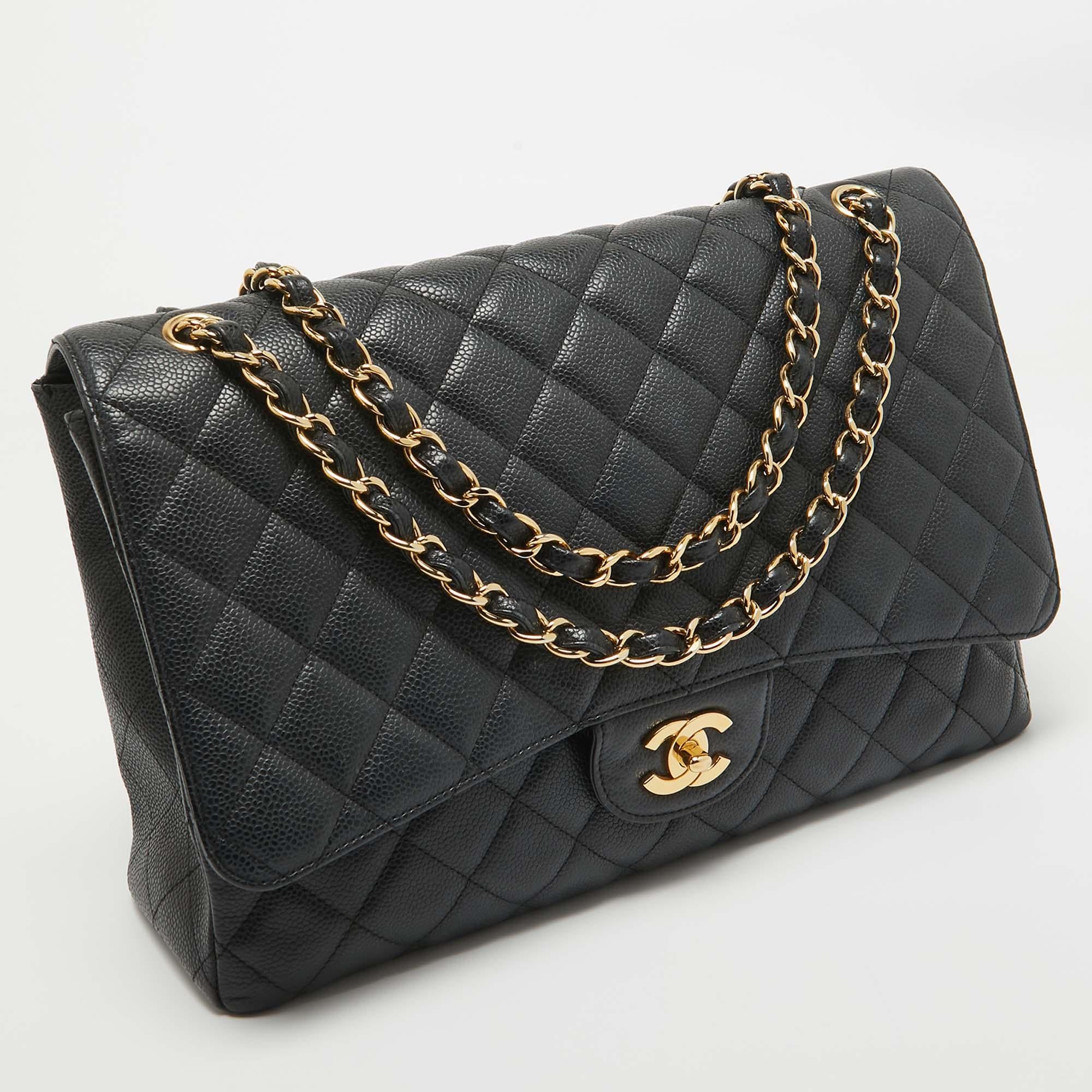 Chanel Black Quilted Caviar Leather Maxi Classic Single Flap Bag In Fair Condition In Dubai, Al Qouz 2