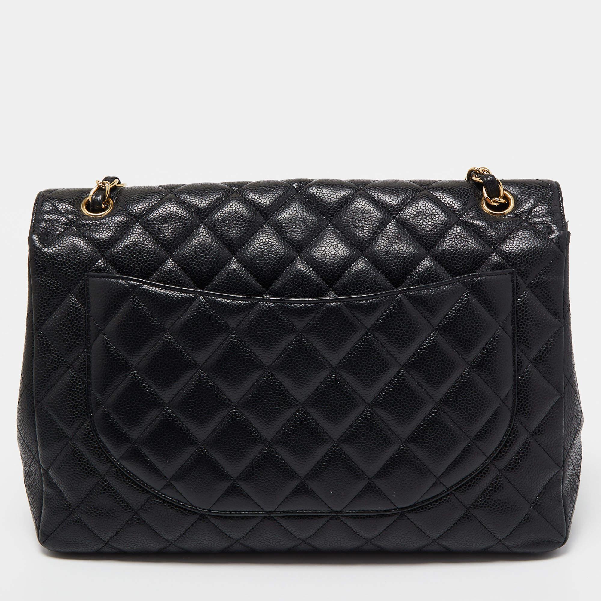 Women's Chanel Black Quilted Caviar Leather Maxi Classic Single Flap Bag For Sale