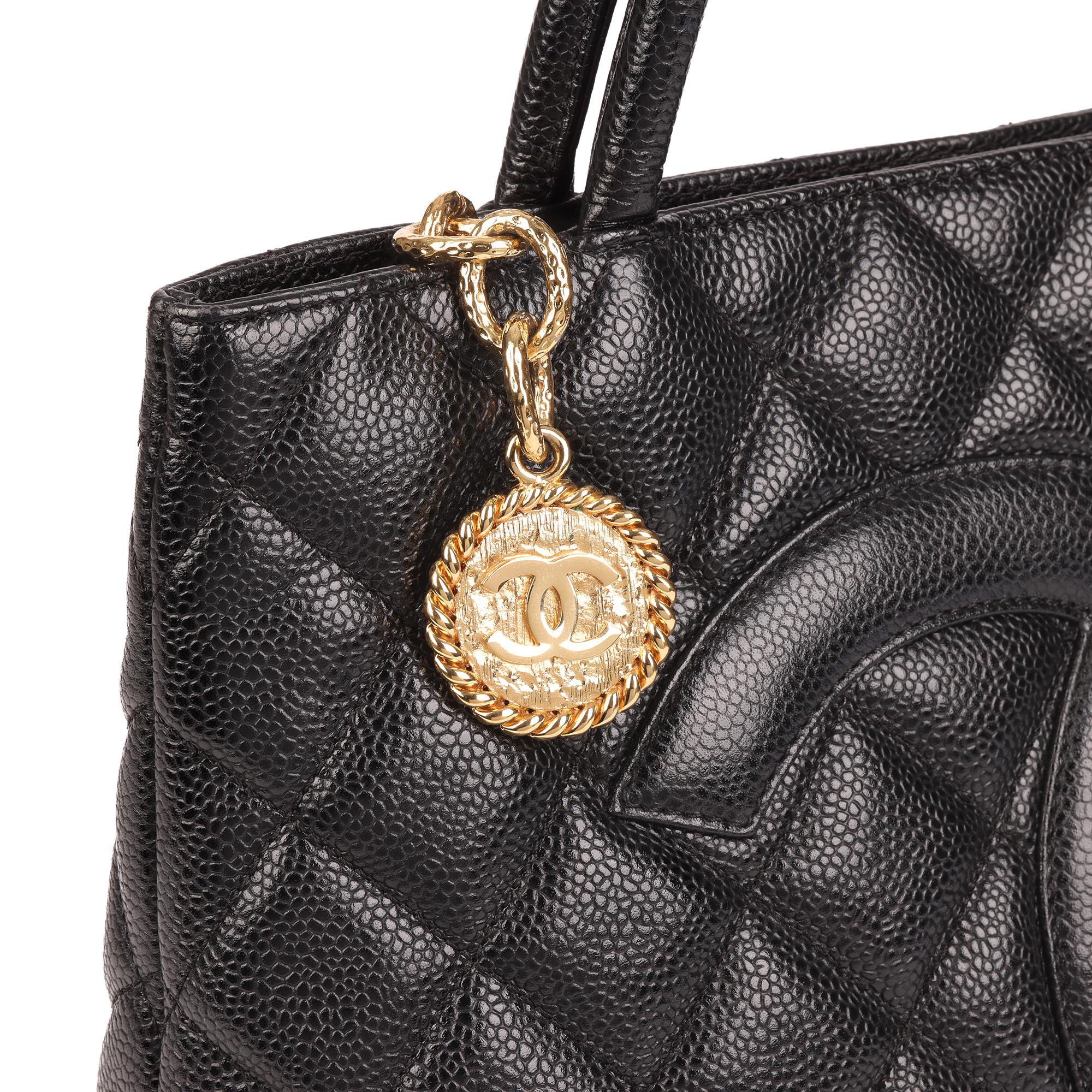 CHANEL
Black Quilted Caviar Leather Medallion Tote

Xupes Reference: HB4076
Serial Number: 8336680
Age (Circa): 2004
Accompanied By: Chanel Dust Bag, Authenticity Card
Authenticity Details: Authenticity Card, Serial Sticker (Made in Italy)
Gender: