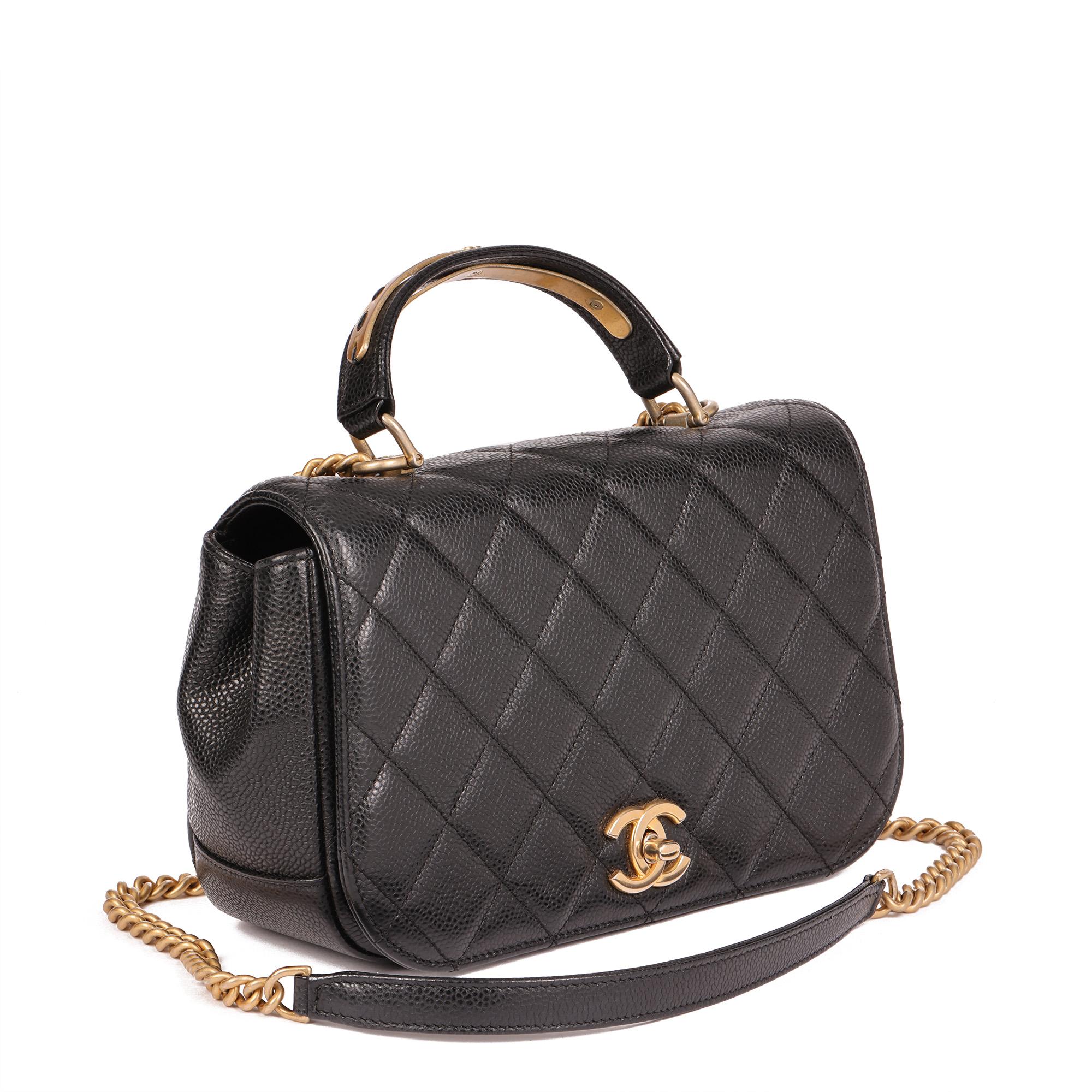 CHANEL
Black Quilted Caviar Leather Medium Classic Top Handle Flap Bag

Serial Number: 24492803
Age (Circa): 2018
Accompanied By: Chanel Dust Bag, Authenticity Card
Authenticity Details: Authenticity Card, Serial Sticker (Made in Italy)
Gender: