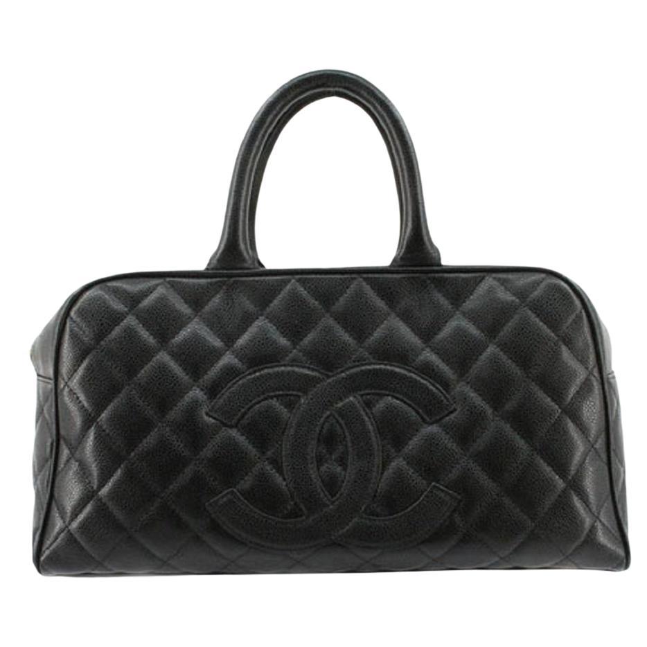 Chanel Schwarze gesteppte Mini Boston-Tasche aus Leder in