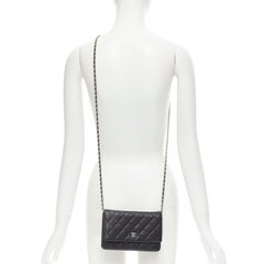 CHANEL black quilted caviar leather silver CC woven chain crossbody WOC bag