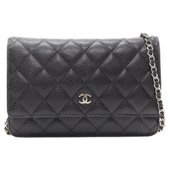 CHANEL black quilted caviar leather silver CC woven chain crossbody WOC bag