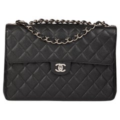 CHANEL Sac à rabat simple classique vintage Jumbo en cuir texturé noir matelassé