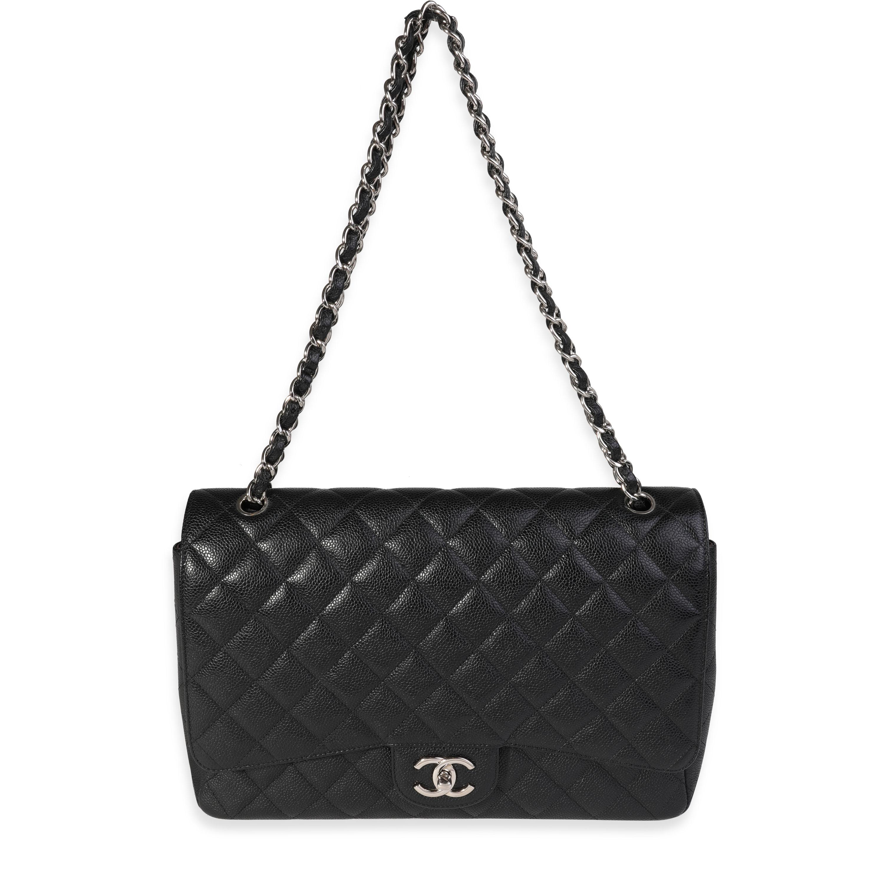 Listing Title: Chanel Black Quilted Caviar Maxi Classic Double Flap Bag
SKU: 121420
MSRP: 10000.00
Condition: Pre-owned (3000)
Handbag Condition: Very Good
Condition Comments: Very Good Condition. Scuffing to corners and lightly to exterior leather.