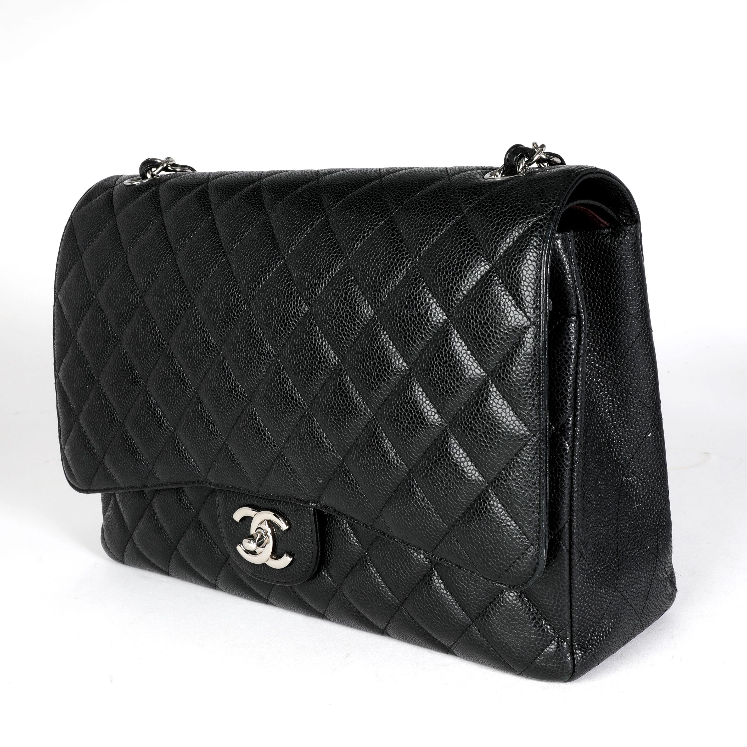 Women's or Men's Chanel Black Quilted Caviar Maxi Classic Double Flap Bag