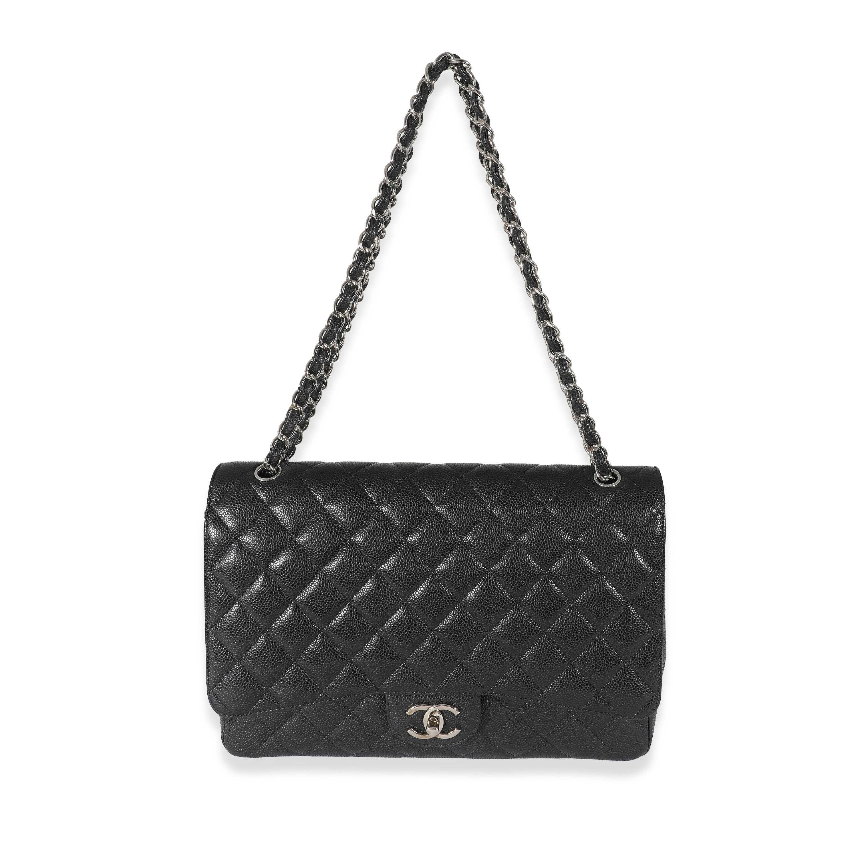 Listing Title: Chanel Black Quilted Caviar Maxi Double Flap Bag
SKU: 133321
MSRP: 11500.00 USD
Condition: Pre-owned 
Handbag Condition: Very Good
Condition Comments: Item is in very good condition with minor signs of wear. Exterior corner scuffing.