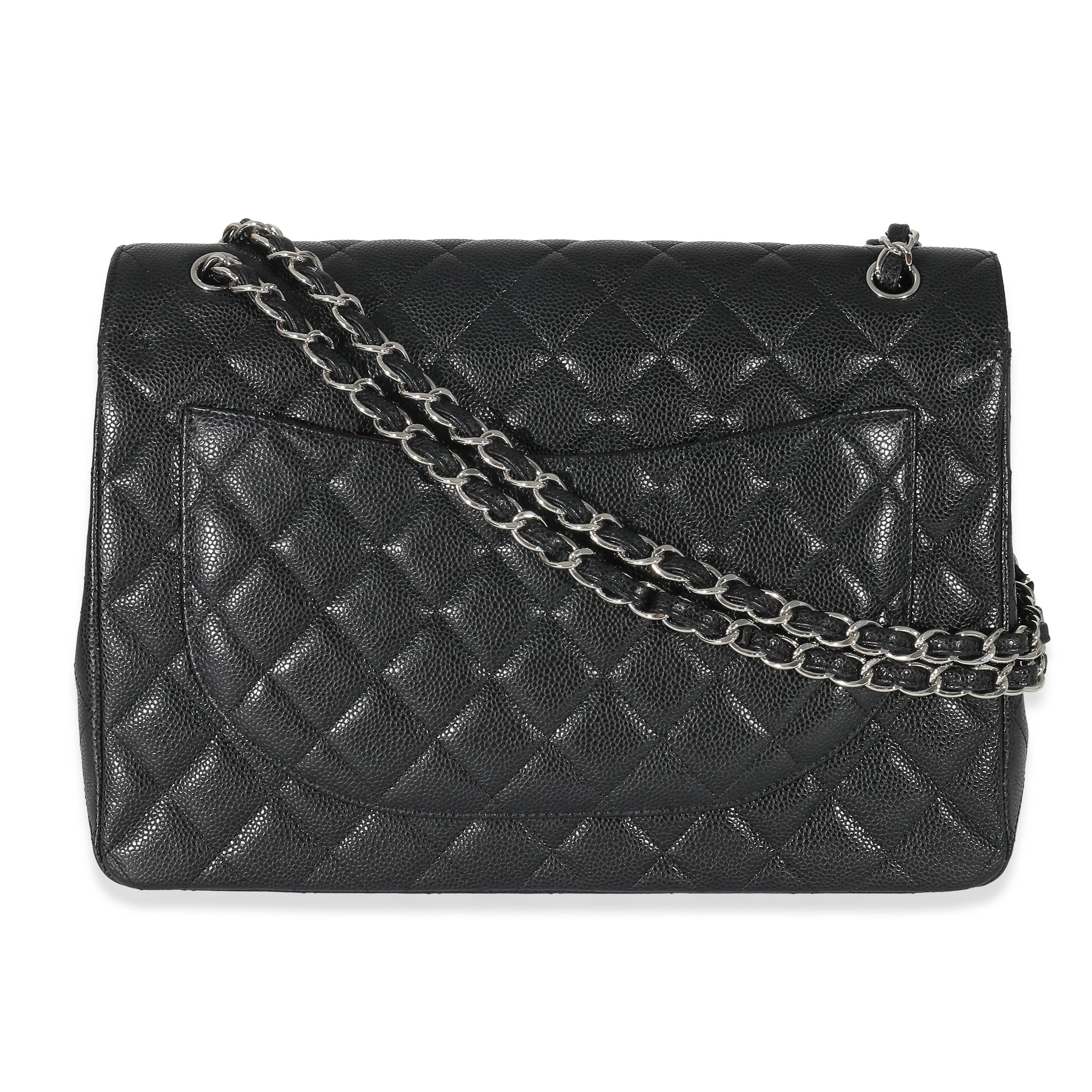 Chanel Black Quilted Caviar Maxi Double Flap Bag In Excellent Condition For Sale In New York, NY