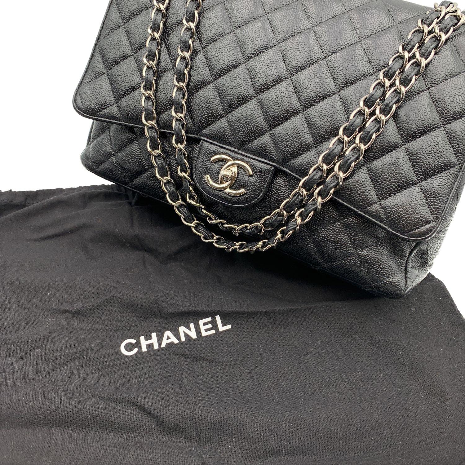 Women's Chanel Black Quilted Caviar Maxi Timeless Classic 2.55 Double Flap Bag For Sale