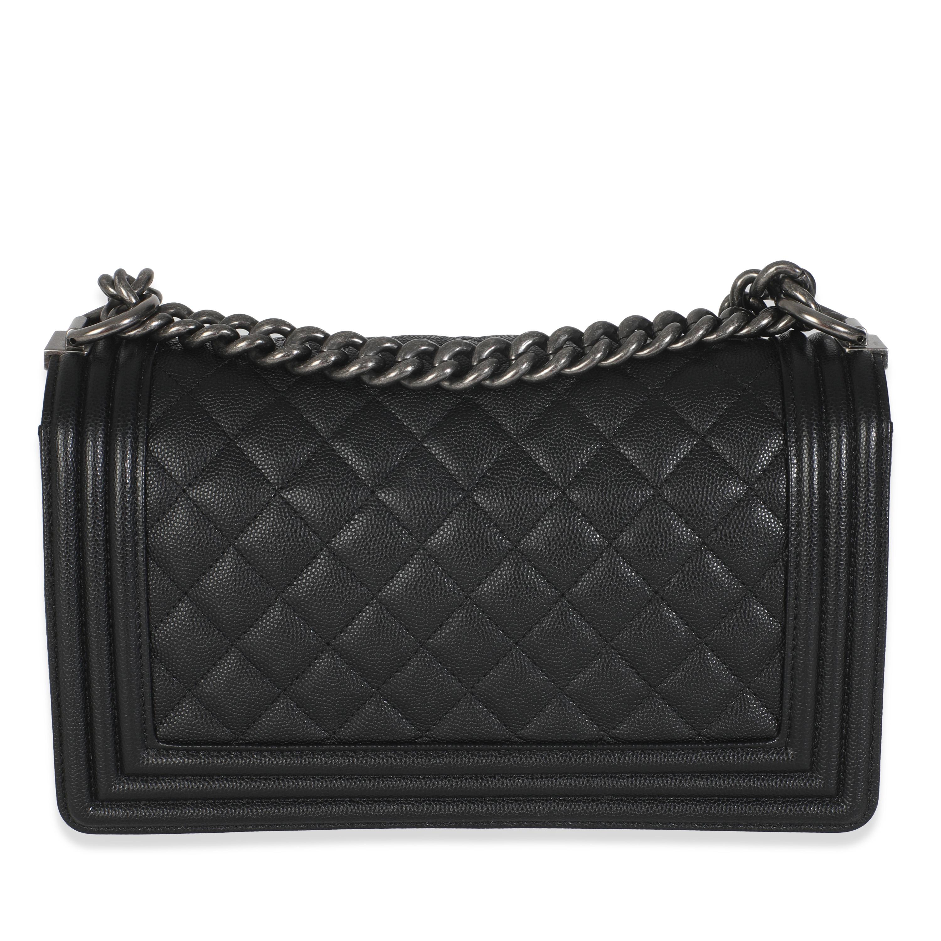 Listing Title: Chanel Black Quilted Caviar Medium Boy Bag
SKU: 146633
Condition: Pre-owned 
Condition Description: An instant classic, the Boy bag from Chanel was introduced in 2011. The quilted bag was designed by the late Karl Lagerfeld, who was