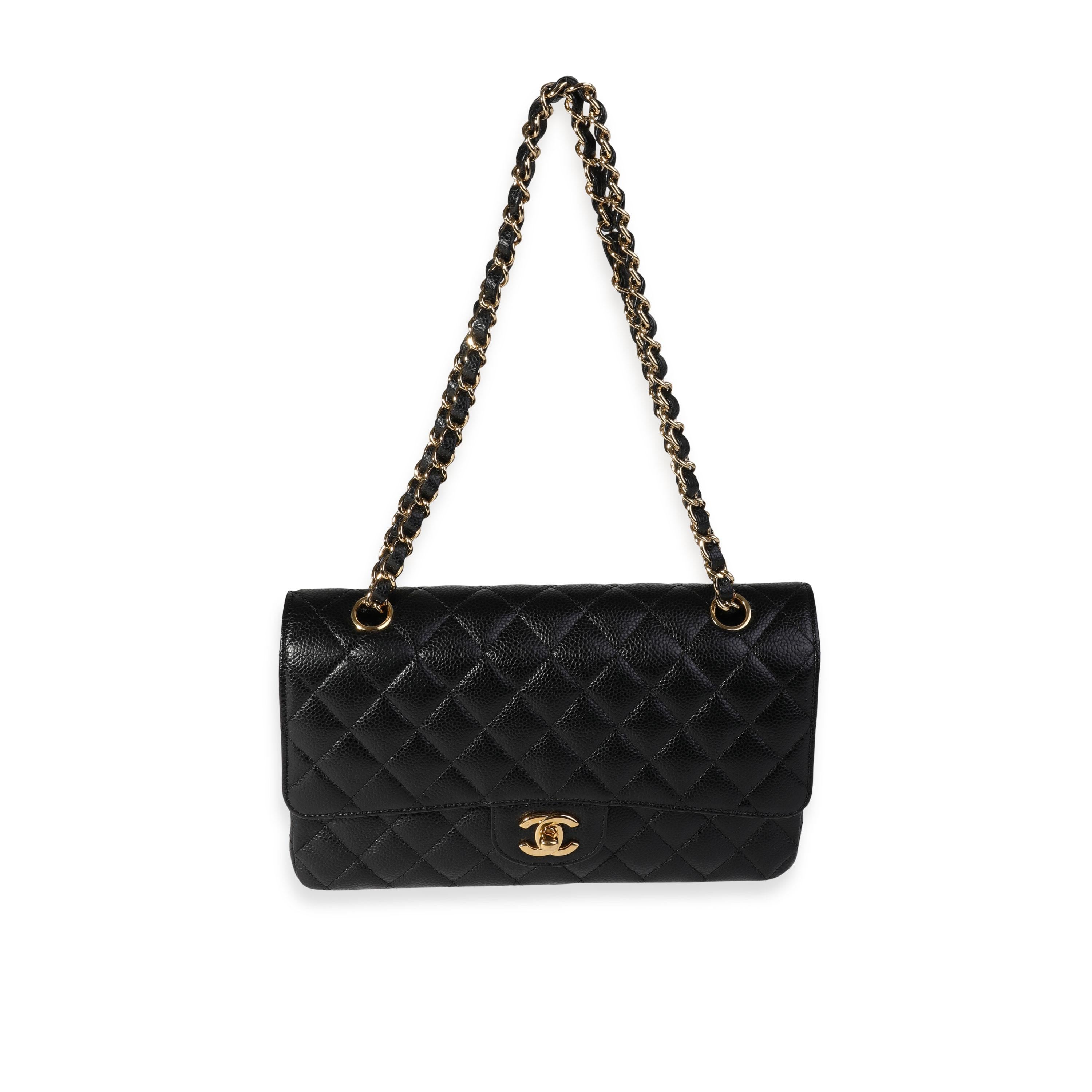 Listing Title: Chanel Black Quilted Caviar Medium Classic Double Flap Bag
SKU: 120545
MSRP: 8800.00
Condition: Pre-owned 
Handbag Condition: Very Good
Condition Comments: Very Good Condition. Light scuffing to exterior. Scratching to hardware.