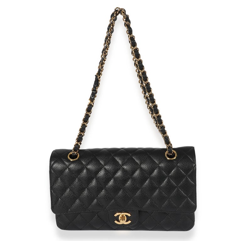Listing Title: Chanel Black Quilted Caviar Medium Classic Double Flap Bag
SKU: 126530
MSRP: 8800.00
Condition: Pre-owned 
Condition Description: A timeless classic that never goes out of style, the flap bag from Chanel dates back to 1955 and has