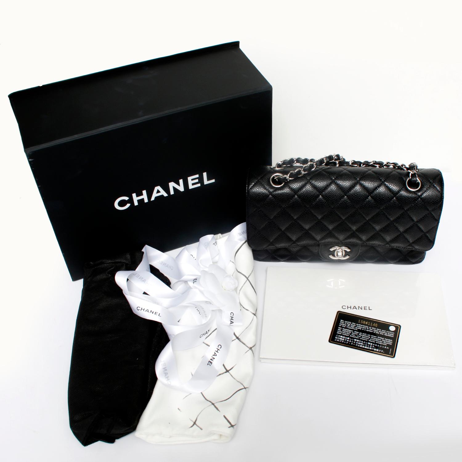 Chanel Black Quilted Caviar Medium Double Flap Bag  - This bag features a front flap with signature CC turnlock closure, a half moon back pocket, and an adjustable interwoven silver chain with black leather shoulder/crossbody strap. The interior is