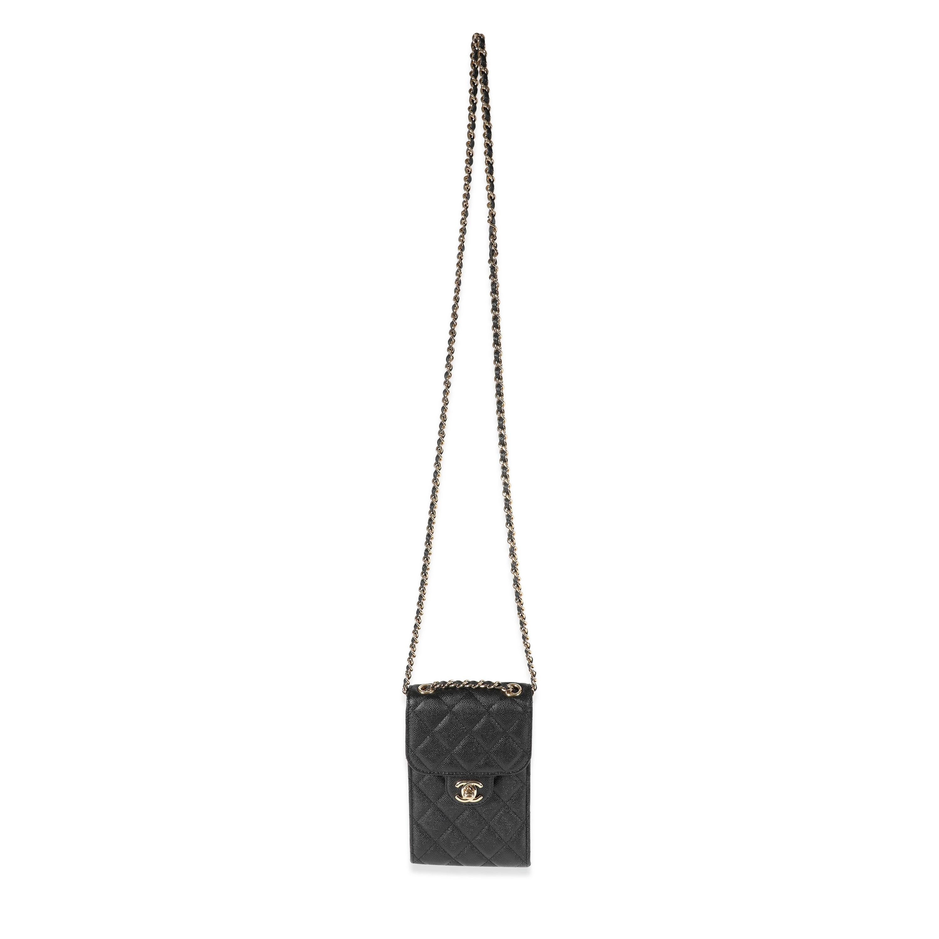 Listing Title: Chanel Black Quilted Caviar Phone Holder Crossbody
SKU: 121787
Condition: Pre-owned 
Handbag Condition: Excellent
Condition Comments: Excellent Condition. Some plastic at hardware. Minor marks at interior. No other visible signs of