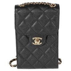 Sac à bandoulière pour téléphone noir matelassé Caviar de Chanel