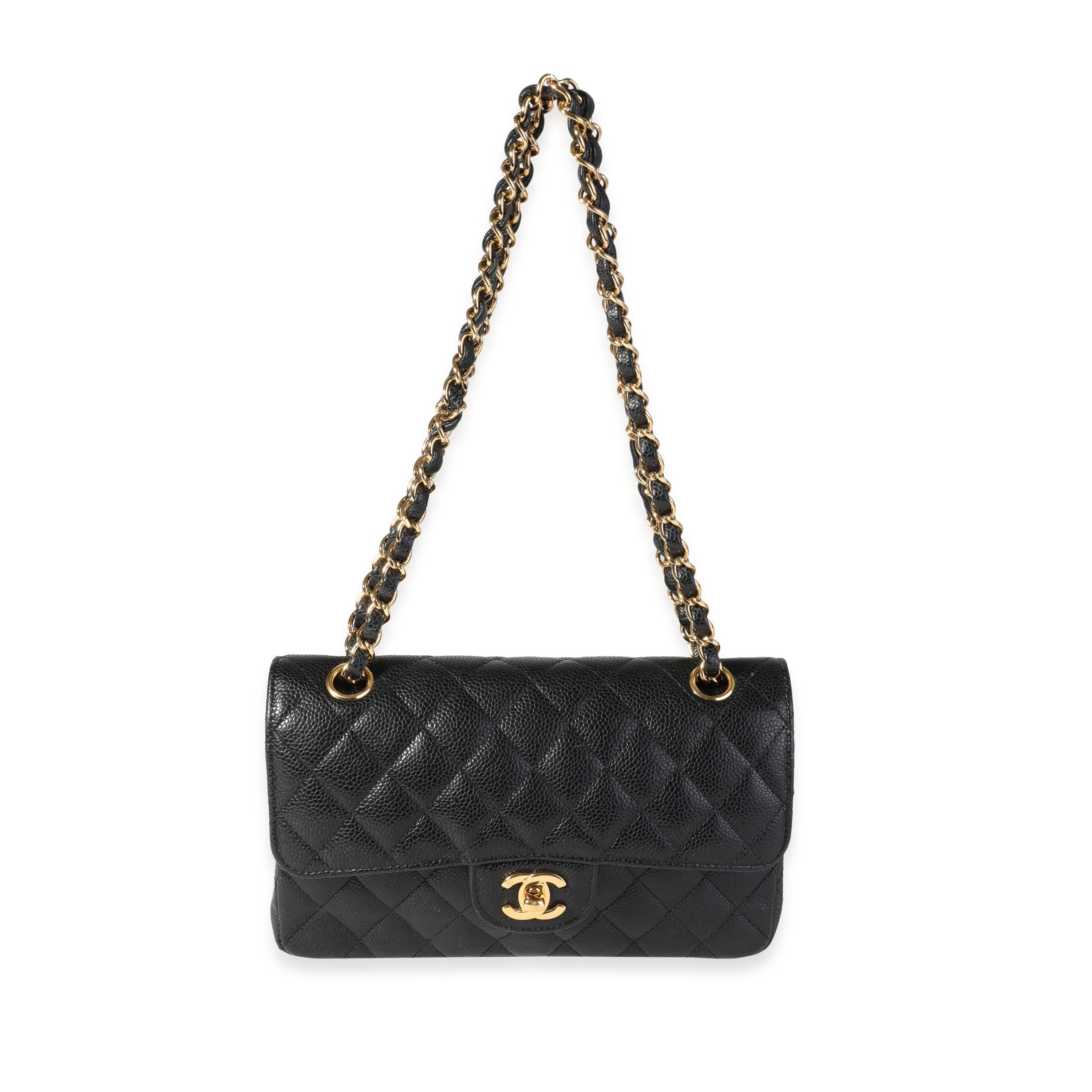 Listing Title: Chanel Black Quilted Caviar Small Classic Double Flap Bag
SKU: 119481
MSRP: 8200.00
Condition: Pre-owned (3000)
Handbag Condition: Excellent
Condition Comments: Minor scuffing at exterior corners.
Brand: Chanel
Model: Black Quilted