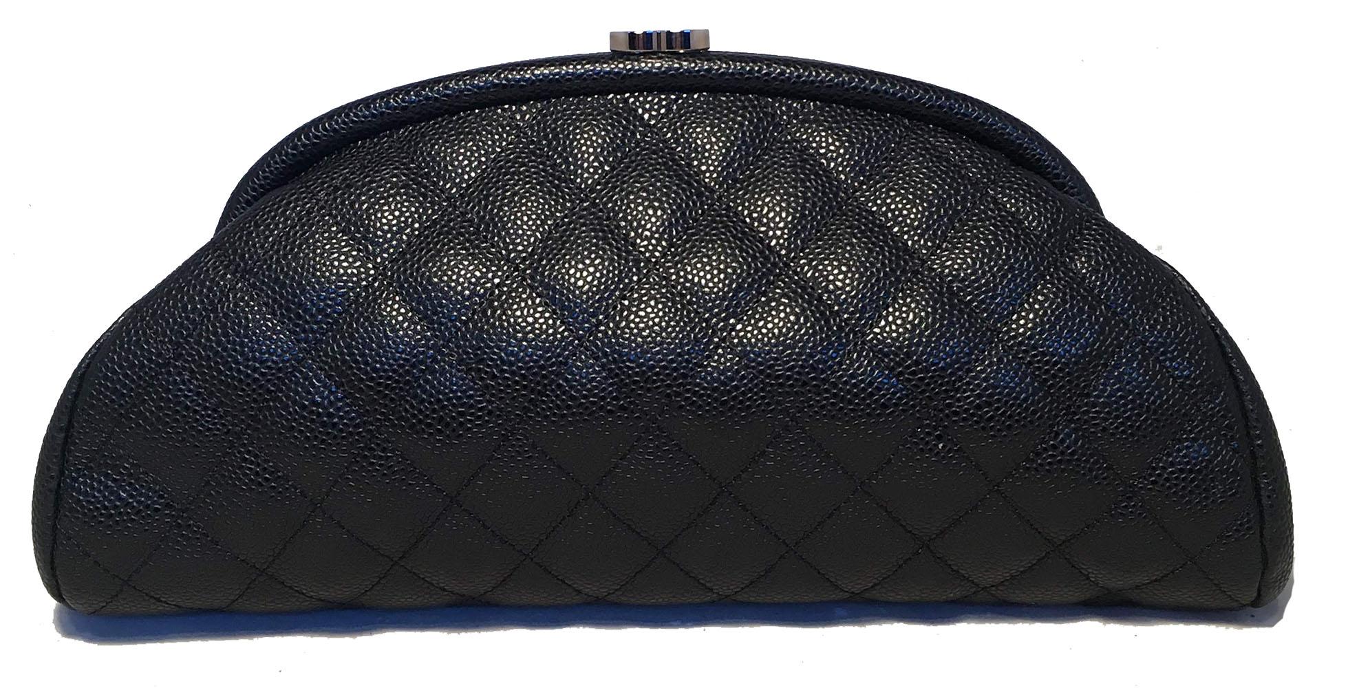 Chanel Black Quilted Caviar Timeless Clutch in excellent condition. Black quilted caviar leather exterior trimmed with a delicate silver CC logo lift closure along top exterior edge. Black leather lined interior with one side zipped pocket. No