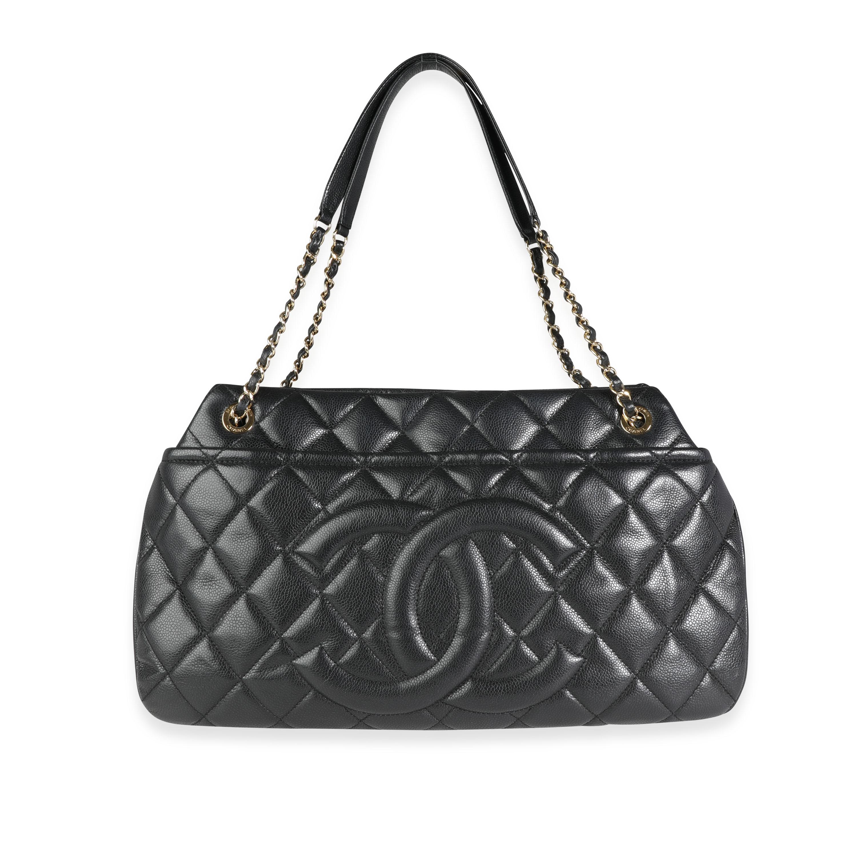 Listing Title: Chanel Black Quilted Caviar Timeless Soft Shopping Tote
SKU: 114848
MSRP: 3300.00
Condition: Pre-owned (3000)
Handbag Condition: Very Good
Condition Comments: Very Good Condition. Light scuffs to leather. Scratching and tarnishing to