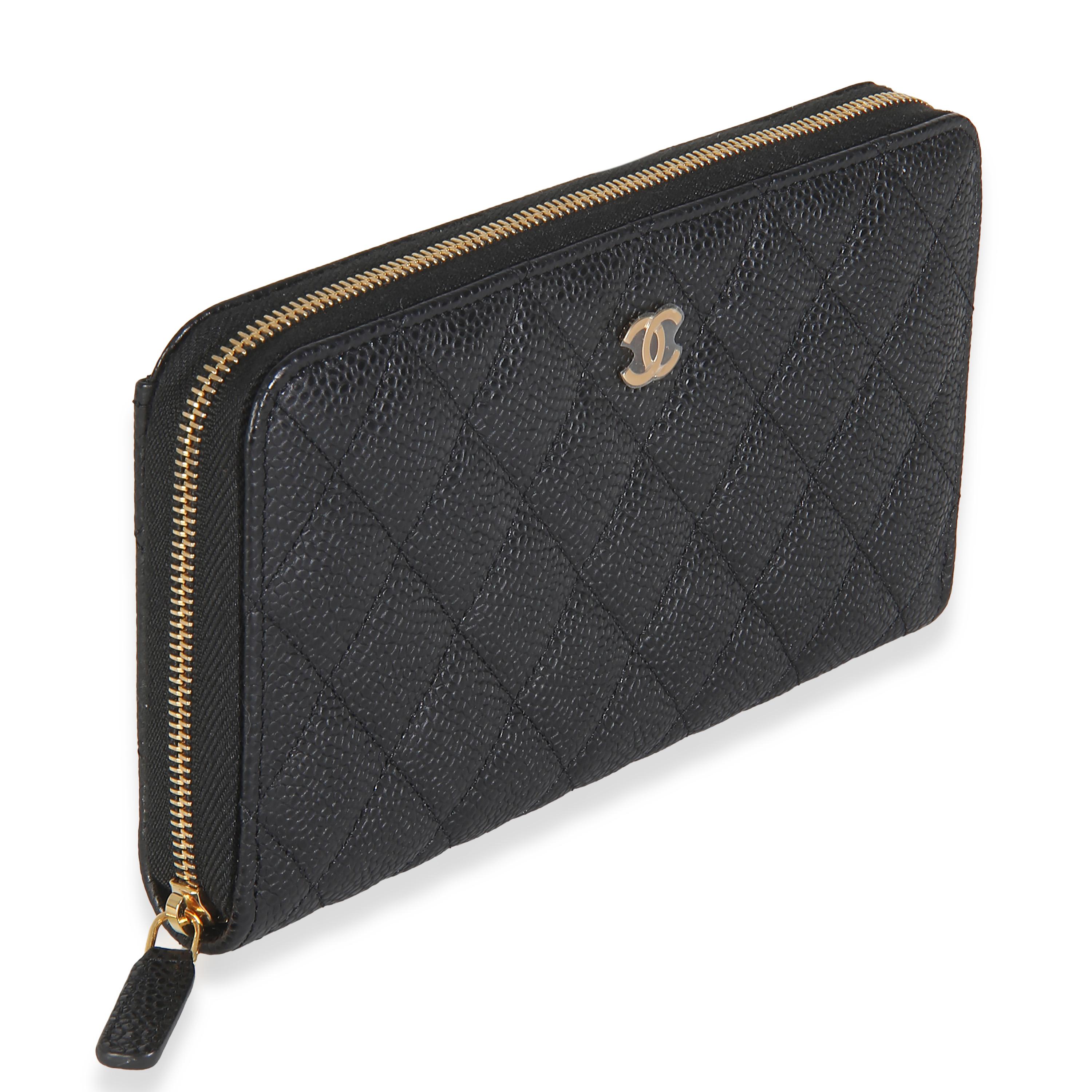 Listing Title: Chanel Black Quilted Caviar Zip Around L-Gusset Wallet
SKU: 146194
Condition: Pre-owned 
Handbag Condition: Excellent
Condition Comments: Item is in excellent condition and displays light signs of wear. Light fraying along zipper