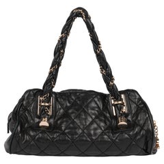 CHANEL Schwarzes gestepptes Lammfell mit Zopfmuster Lady Bowler