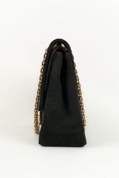 Chanel - Sac en jersey matelassé noir