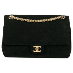 Chanel - Sac en jersey matelassé noir