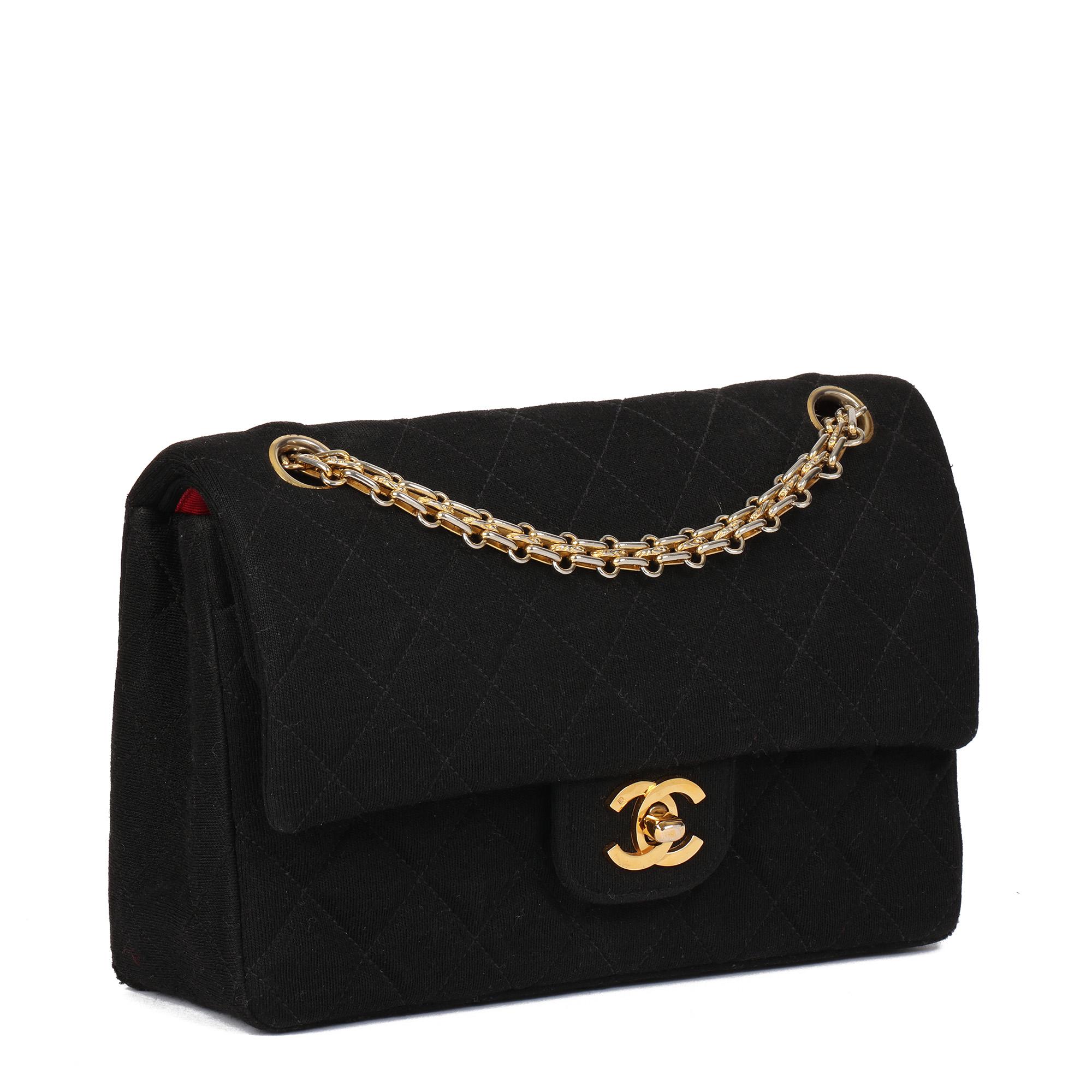 Chanel BLACK QUILTED JERSEY VINTAGE SMALL CLASSIC DOUBLE FLAP BAG

CONDITION NOTES
The exterior is in excellent condition with light signs of use.
The exterior is in very good condition with light signs of use. There are small visible pen marks and